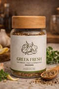 Jar of 'Greek Fresh' seasoning with a wooden spoon filled with spices 